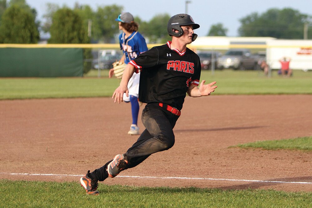 Sophomore Ty King came through in a big way in both IHSA Class 2A baseball regional games this week. In this photo from Monday, King rounds third to score in the regional quarterfinal against OPH. Thursday evening, he hit his first homer of the year to help power the Tigers past Lawrenceville 6-5 and move on to face Newton in the regional title game at 10 a.m. today.